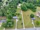 Aerial view of homes featuring long driveways and expansive green lawns at 743 New Hope Rd, Lawrenceville, GA 30046