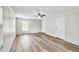 Spacious bedroom features wood-look floors, a ceiling fan and plenty of natural light at 743 New Hope Rd, Lawrenceville, GA 30046