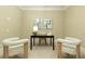 Cozy home office with unique chairs and calming artwork at 385 Windy Pines Trl, Roswell, GA 30075