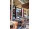 Charming restaurant with outdoor seating, ceiling fans, and brick paving, perfect for enjoying a meal at 385 Windy Pines Trl, Roswell, GA 30075