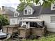 Rear exterior of home with deck, gazebo, and mature trees in the background at 55 Beverly Ne Rd, Atlanta, GA 30309