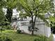 Charming two-story home with brick and white painted siding and landscaped yard at 55 Beverly Ne Rd, Atlanta, GA 30309
