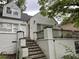 Two-story brick home with dormer windows and an inviting front entrance at 55 Beverly Ne Rd, Atlanta, GA 30309