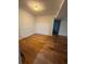 Traditional dining room offers hardwood floors and classic wainscoting details at 6449 Pinebark Way, Morrow, GA 30260