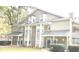 Multi-Gathering exterior view showcases architectural detail, siding, and well-maintained landscaping at 6449 Pinebark Way, Morrow, GA 30260