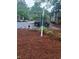 A community street sign shows the way to homes seven and eight at 6449 Pinebark Way, Morrow, GA 30260
