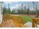 Lovely back deck with stained wood overlooking a grassy yard at 1330 Adams Sw Dr, Atlanta, GA 30311