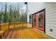 Back deck with red framed doors to the interior at 1330 Adams Sw Dr, Atlanta, GA 30311