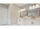 Bathroom features double vanity with modern fixtures and plenty of storage space at 1330 Adams Sw Dr, Atlanta, GA 30311