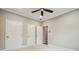 Bedroom featuring carpeting, ample closet space, neutral paint, a ceiling fan, and great lighting at 1330 Adams Sw Dr, Atlanta, GA 30311