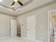 Bedroom with carpet floors, neutral walls, white trim, and doorway to adjacent room at 1330 Adams Sw Dr, Atlanta, GA 30311