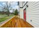 Charming front porch featuring a red door and light fixture at 1330 Adams Sw Dr, Atlanta, GA 30311