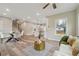 Open-concept living space with dining area, contemporary design, and ample lighting for modern living at 1330 Adams Sw Dr, Atlanta, GA 30311