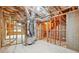 The unfinished basement features exposed framing and ductwork at 1330 Adams Sw Dr, Atlanta, GA 30311