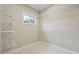 Walk-in closet features built-in shelving for maximum storage at 1330 Adams Sw Dr, Atlanta, GA 30311