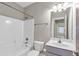 Cozy bathroom featuring a tub, sink, vanity, and toilet at 1628 Briarcliff Ne Rd # 15, Atlanta, GA 30306
