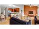Bright living room featuring an open floor plan, modern kitchen with stainless steel appliances, and a cozy seating area at 1628 Briarcliff Ne Rd # 15, Atlanta, GA 30306