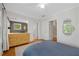 Charming bedroom offers a cozy view into another room with ample storage at 2705 Osborne Ne Rd, Brookhaven, GA 30319