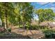 A long driveway with trees providing shade at 2705 Osborne Ne Rd, Brookhaven, GA 30319