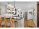 Contemporary kitchen with stainless steel appliances, stylish pendant lighting, and an open layout at 2705 Osborne Ne Rd, Brookhaven, GA 30319