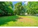 Flat and spacious backyard is perfect for Gathering and entertaining at 6082 Raintree Bnd, Lithonia, GA 30058