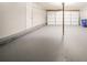 Spacious two car garage with painted floors and plenty of room for storage at 6082 Raintree Bnd, Lithonia, GA 30058
