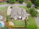 A high angle view of a home showing the backyard patio and lush landscaping at 6263 Fernstone Nw Trl, Acworth, GA 30101