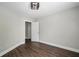 Bright bedroom with a view into the hallway through a standard door at 6263 Fernstone Nw Trl, Acworth, GA 30101