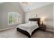 Bright Bedroom with a vaulted ceiling, large window and comfortable furniture at 6263 Fernstone Nw Trl, Acworth, GA 30101