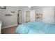Cozy bedroom with blue bedding and charming decor at 6263 Fernstone Nw Trl, Acworth, GA 30101