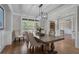 Inviting dining room featuring hardwood floors and stylish lighting at 6263 Fernstone Nw Trl, Acworth, GA 30101