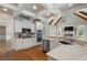 Bright kitchen features white cabinets, stainless steel appliances, coffered ceilings and an eat-in area at 6263 Fernstone Nw Trl, Acworth, GA 30101
