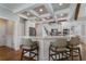 Bright kitchen featuring coffered ceilings, granite countertops and stainless appliances at 6263 Fernstone Nw Trl, Acworth, GA 30101