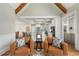 View from the living room into the kitchen and breakfast nook with hardwood floors and white trim at 6263 Fernstone Nw Trl, Acworth, GA 30101