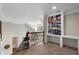 Charming upstairs loft space featuring built-in shelving and desk area at 6263 Fernstone Nw Trl, Acworth, GA 30101
