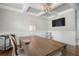 Office with coffered ceiling, hardwood floors, lamp, and modern decor at 6263 Fernstone Nw Trl, Acworth, GA 30101