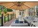 Inviting patio with a modern design, comfortable seating, and relaxing ambiance at 6263 Fernstone Nw Trl, Acworth, GA 30101