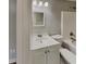 Bathroom features new vanity with sink, mirror and lighting above, and a shower-tub combination at 119 Michelle Dr, Mcdonough, GA 30252