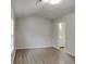 Clean, bright bedroom with large closet and en-suite bathroom featuring new laminate flooring at 119 Michelle Dr, Mcdonough, GA 30252