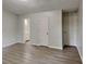 Clean, bright bedroom with large closet and en-suite bathroom featuring new laminate flooring at 119 Michelle Dr, Mcdonough, GA 30252