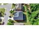 Residential home in a well-maintained neighborhood featuring mature trees and landscaping at 4610 Point Rock Dr, Buford, GA 30519