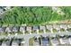 Gathering-friendly neighborhood with neatly manicured lawns and tree-lined streets at 4610 Point Rock Dr, Buford, GA 30519