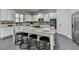 Kitchen with center island featuring granite countertops and seating at 4610 Point Rock Dr, Buford, GA 30519