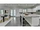 Open kitchen with island and dining area, perfect for entertaining guests at 4610 Point Rock Dr, Buford, GA 30519