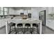 Large kitchen island with seating and granite countertops at 4610 Point Rock Dr, Buford, GA 30519
