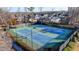 Well-maintained community tennis courts offer recreational opportunities for residents at 4610 Point Rock Dr, Buford, GA 30519
