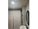 Bright bathroom featuring a shower with a white curtain and a modern sink at 3014 Echols Rd, Cumming, GA 30041