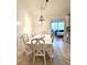 Cozy dining room with chandelier and seating for six at 3014 Echols Rd, Cumming, GA 30041