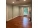 Bright living room with hardwood floors and natural lighting at 3014 Echols Rd, Cumming, GA 30041