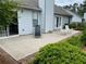 Back patio with lounge chairs and a dining set, ideal for outdoor entertaining at 5298 Autumn Run Dr, Powder Springs, GA 30127